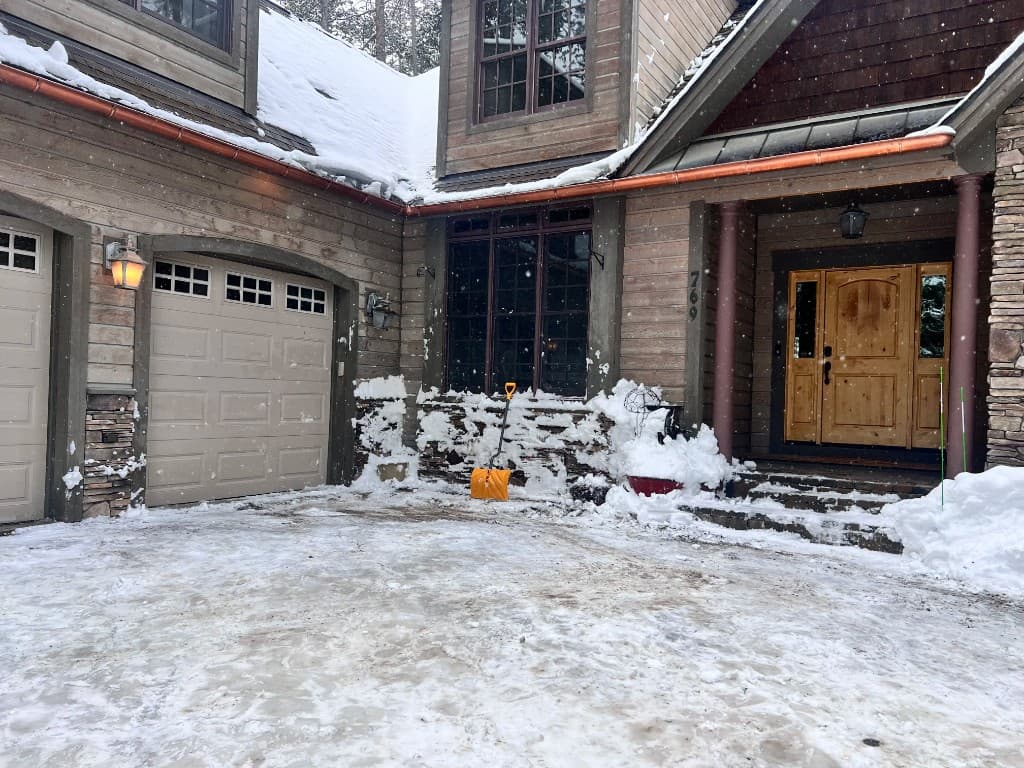 Snow removal at residential property entrance